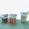 Beyaz Özel baskılı PP tek kullanımlık yüzlü süt/yoğurt/Çay bardağı coloful kapaklı plastik bardak